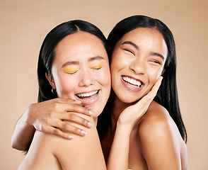 Image showing Beauty, love and diversity with model woman friends in studio on a beige background for natural skincare. Makeup, health and wellness with an attractive young female holding the head of her friend