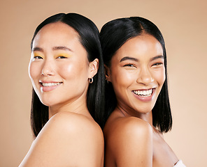 Image showing Portrait, makeup and diversity with model woman friends in studio on a beige background for skincare. Face, skin and wellness with a young female and friend posing to promote a cosmetic product