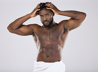 Image showing Muscular, portrait and black man with cosmetics, skincare and confident guy on grey studio background. African American male, body builder or person with muscles, torso or dermatology for smooth skin