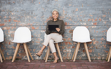 Image showing Recruitment, portrait and black woman tablet outside for job opportunity, hr and career success. Digital technology, waiting room and gen z person on social media app for we are hiring on brick wall