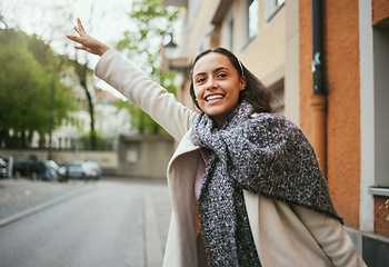 Image showing Woman, travel and hailing taxi hand in city, street or New York road in transportation, traveling and commute. Happy tourist, student and person waiting for cab, lift stop or sightseeing location bus