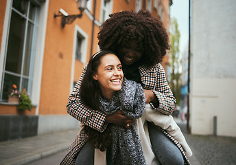 Image showing Friends piggyback, adventure and travel in city, happy people with smile and women together in Italy for holiday. Happiness, diversity with vacation and tourist have fun with freedom and joy