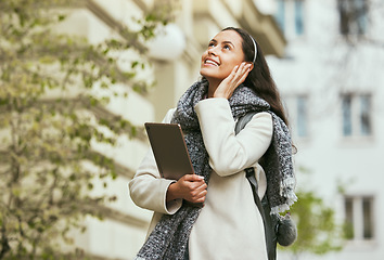 Image showing Travel, walking and woman with tablet in city in street, road and sidewalk in for urban adventure in London. Journey, freedom and girl enjoying holiday, vacation and weekend for tourism sightseeing