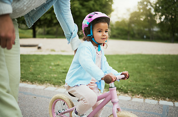 Image showing Mother, girl and learning with bike in street, road or park for love, bonding and happy on holiday. Mom, kid and teaching, cycling and bicycle on adventure, outdoor or neighborhood for development