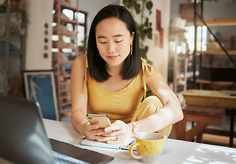 Image showing Asian woman, cafe and smartphone for connection, remote work and lady with online research, chatting and comfortable. Female, creative and freelancer in coffee shop, relax and texting for project