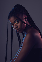 Image showing Beauty, makeup and portrait of a black woman in a studio with braids, cosmetic and natural face. Cosmetics, beautiful and young African female model with a facial treatment by a dark gray background.