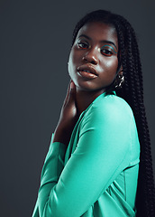 Image showing Fashion, stylish and portrait of a confident black woman isolated on a black background in studio. Fashionable, attractive and face of an African model with confidence and empowerment on a backdrop