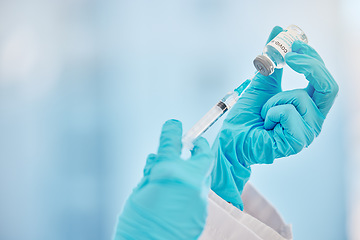 Image showing Covid vaccine, injection and hands of a doctor with medicine, virus cure and medication at clinic. Healthcare, corona and medical worker extracting liquid from a syringe for a hospital vaccination