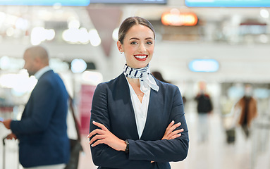 Image showing Airport, woman concierge and portrait with smile, arms crossed and vision for career in international travel. Customer service, transport service expert and happy for job with motivation at workplace