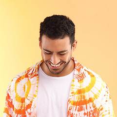 Image showing Happy hipster man, studio and tie dye fashion shirt with smile, excited and relax by yellow background. Gen z model, clothes and summer style with happiness, color and natural aesthetic by backdrop