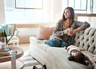 Image showing Relax, morning tea and woman with dog on a home living room couch feeling calm with happy lifestyle. Happiness and smile of person with puppy thinking with coffee on peaceful lounge day in a house