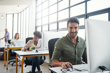 Image showing Designer, portrait or business man on computer in building office for research, company strategy or communication. Startup, smile or employee with tech for social network, creative planning review