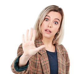 Image showing Portrait, woman and hand, stop and warning in studio for sign or wait gesture on white background. Face, hands and girl showing palm for reject, prohibited and emoji with serious order while isolated