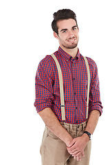 Image showing Nerd, geek and portrait of a hipster in studio with white background isolated with a beard. Smiling, smart and nerdy style clothes of male standing with happiness and smile feeling positive in plaid