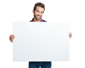 Image showing Portrait, marketing or business man with paper mockup space for product, advertising or branding poster in studio. Model, smile or businessman with banner, billboard news or logo in white background