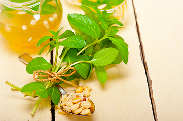 Image showing Arab traditional mint and pine nuts tea