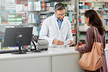 Image showing Medicine, service and help of pharmacist consulting at health store counter with expert knowledge. Medication advice and trust of girl with kind worker checking information at pharmacy.