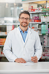 Image showing Pharmacist man, pharmacy portrait and writing medicine, product or healthcare receipt signature for industry trust. Expert, help desk and medical professional worker smile for doctor notes insurance