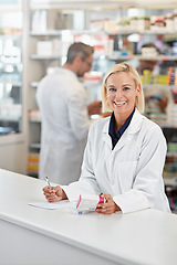 Image showing Portrait of pharmacist woman writing medicine notes, product or healthcare receipt signature in pharmacy trust. Inventory box, stock help desk and medical professional worker, sign prescription paper