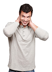 Image showing Face, smile and shy man in studio isolated on a white background looking happy and shy. Thinking, cool and modern model male posing in casual clothes for trendy style and positive mindset or idea