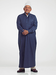 Image showing Muslim old man, studio portrait and islamic culture standing isolated on white background with arabic clothes. Senior moslem person, eid mubarak and spiritual worship for ramadan, fasting or allah.