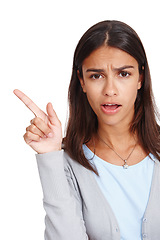 Image showing Confused woman, portrait and pointing at space for mockup sale, discount or promotion. Shocked face of female model with hand for advertising or product placement isolated on a white background