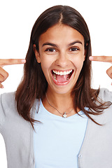 Image showing Portrait, wow and surprise with a woman in studio isolated on a white background pointing to her head. Face, omg and shock with an attractive young female saying wtf closeup on blank space