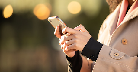 Image showing Hands, communication or business woman with phone for networking or social media in London street. Search, travel or manager with 5g smartphone for research, internet or blog content review outdoor