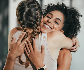 Image showing Happy, friends and hug with women in gym for for fitness, exercise and workout. Well done, congratulations and support with girl athlete training together for sports, mindset and wellness motivation