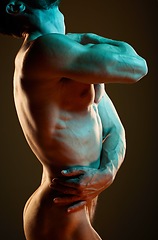 Image showing Muscle, strong and body of a nude man with erotic creativity isolated on black background in studio. Creative, flexing and sexy naked model in fluorescent lighting for sensuality on a backdrop