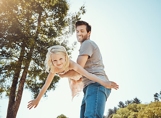 Image showing Happy, park and dad playing with child, bonding and airplane game for father and daughter time outside. Family, love and smile, playful energy, man holding girl in air and laughing in garden together