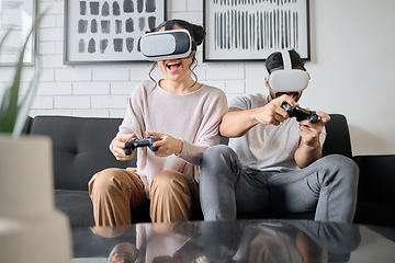 Image showing VR, gaming and metaverse with a couple playing video games in their home together for fun or enjoyment. Virtual reality, game and 3d ai with a man and woman gamer bonding in a house living room