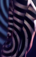 Image showing Stripes, beauty and naked woman in studio for sexual desire, erotic art and body wellness on black background. Creative light, fashion and torso silhouette of nude girl in black and white aesthetic