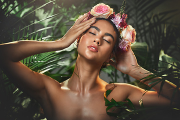 Image showing Beauty, skincare and flowers with woman in jungle for tropical cosmetics, spring and natural makeup. Exotic, forest and nature with girl model and rose crown in trees for health, summer and plant