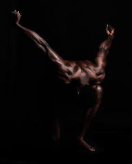 Image showing Body, muscle and art deco of a strong black man in dark studio for power and strength. Sports person or bodybuilder person for motivation, health and wellness for fitness model background