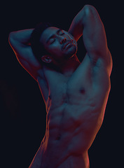 Image showing Naked, art and freedom with a model asian man in studio on a dark background for artistic body positivity. Skin, natural and artwork with a handsome young male posing nude on a black backdrop