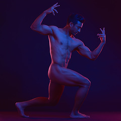 Image showing Nude, art and art with a strong asian man in studio on a dark background for artistic and sexy body. Skin, natural and muscle with a handsome young male model posing naked on a black backdrop