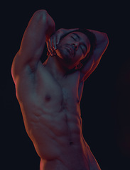 Image showing Nude, skin and freedom with a model asian man in studio on a dark background for artistic body positivity. Art, natural and artwork with a handsome young male posing naked on a black backdrop