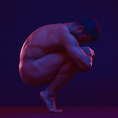 Image showing Nude, art and fetal with a model asian man in studio on a dark background for artistic body positivity. Skin, natural and freedom with a handsome young male posing naked on a black backdrop