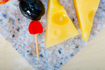 Image showing mix cold cut on a stone with fresh pears