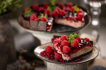 Image showing Cheeseckae with raspberry jelly topping