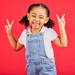 Image showing Happy, peace sign and wink with portrait of girl for summer, happiness and funny face. Meme, fashion and smile with child and hand sign for youth, comedy and positive in red background studio