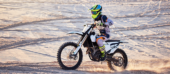 Image showing Motorcycle, desert race and extreme sport expert with agile speed, power or balance in nature. Motorbike man, rally and sand on fast vehicle with helmet, safety clothes and motivation for motorsport