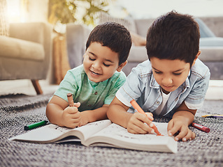 Image showing Children, learning and brothers drawing on a floor in their home, relax and happy while bonding. Kids, art and sketch in notebook by siblings having fun in living room, smile and enjoying brotherhood