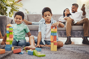 Image showing Family, toys and living room floor fun of children doing a learning knowledge development activity. Watching tv, parents and kids at home with love and care together building blocks for education