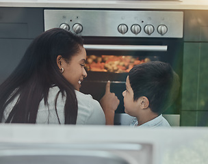 Image showing Cooking, kid learning and stove food check with mother and child ready for teaching at home. Mom, boy and morning breakfast with happiness and parent care with happy young person helping mama