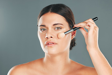 Image showing Woman, beauty brush and makeup portrait for wellness, cosmetics dermatology and skincare in studio. Model, facial application and cosmetology lifestyle or luxury product tools for self care glow