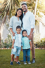 Image showing Family, portrait and garden of a mother, father and children outside house happy about real estate. Happiness, smile and parent youth love of a mom and kids together on grass outdoor in summer