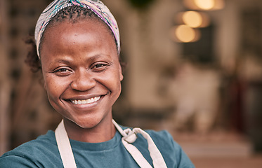 Image showing Small business, entrepreneur and portrait of a woman owner standing in her pottery store or shop. Happy, smile and creative African female boss, ceo or manager with a clay workshop or studio.