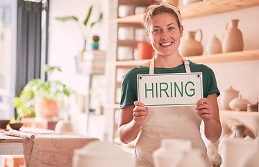 Image showing Hiring sign, woman and small business owner in portrait for shop recruitment, retail job advertising and career manager. Boss, person or employer with hand holding message for onboarding opportunity